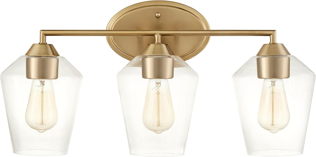 Aspen Creative 62738-27-3, Three-Light Metal Bathroom Vanity Wall Light Fixture, 22-1/4' Wide, Transitional Design in Light Bronze with Clear Glass Shade.
