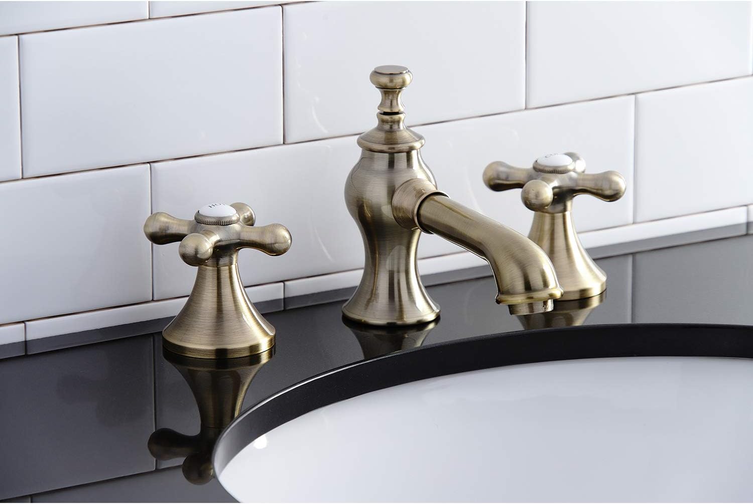 Kingston Brass KC7063AX Vintage Widespread Bathroom Faucet, Antique Brass, 8 x 5.63 x 3.06