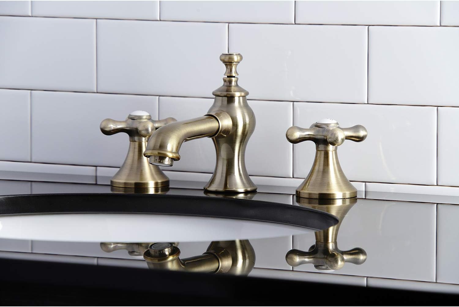 Kingston Brass KC7063AX Vintage Widespread Bathroom Faucet, Antique Brass, 8 x 5.63 x 3.06