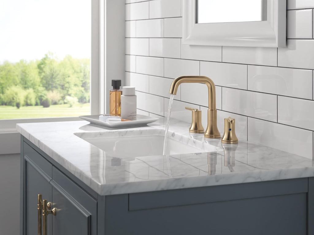 Delta Trinsic U-Spout Widespread Bathroom Faucet, Gold 3-Hole Bathroom Sink Faucet, Metal Push-Pop Drain Assembly, Champagne Bronze 3554-CZMPU-DST