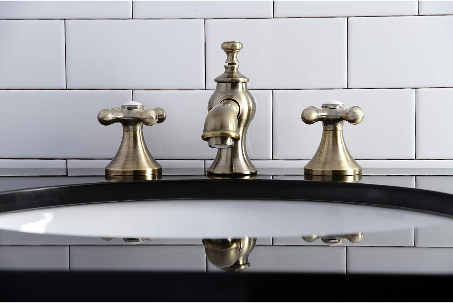 Kingston Brass KC7063AX Vintage Widespread Bathroom Faucet, Antique Brass, 8 x 5.63 x 3.06