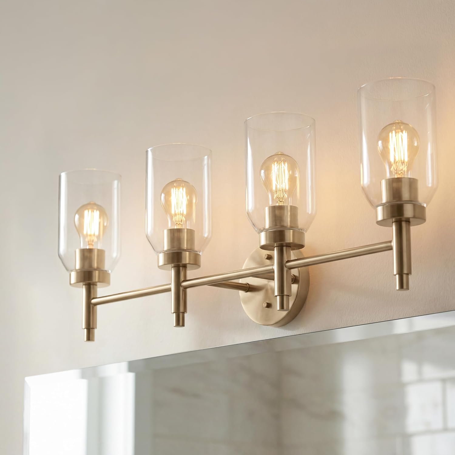 Kichler Madden 4-Light Bathroom Vanity Light Fixture with Clear Glass Shades in Champagne Bronze, Modern Wall Mount for Single or Double Vanity Over Mirror (10.5' x 34'), 55186CPZ