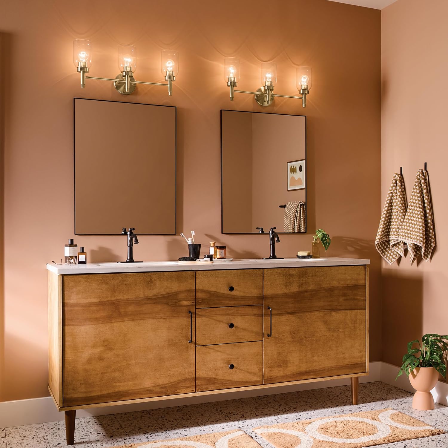 Kichler Madden 3-Light Bathroom Vanity Light Fixture with Clear Glass in Champagne Bronze, Modern Wall Mount Lighting for Single Vanity Mirror (10.5' x 24'), 55185CPZ