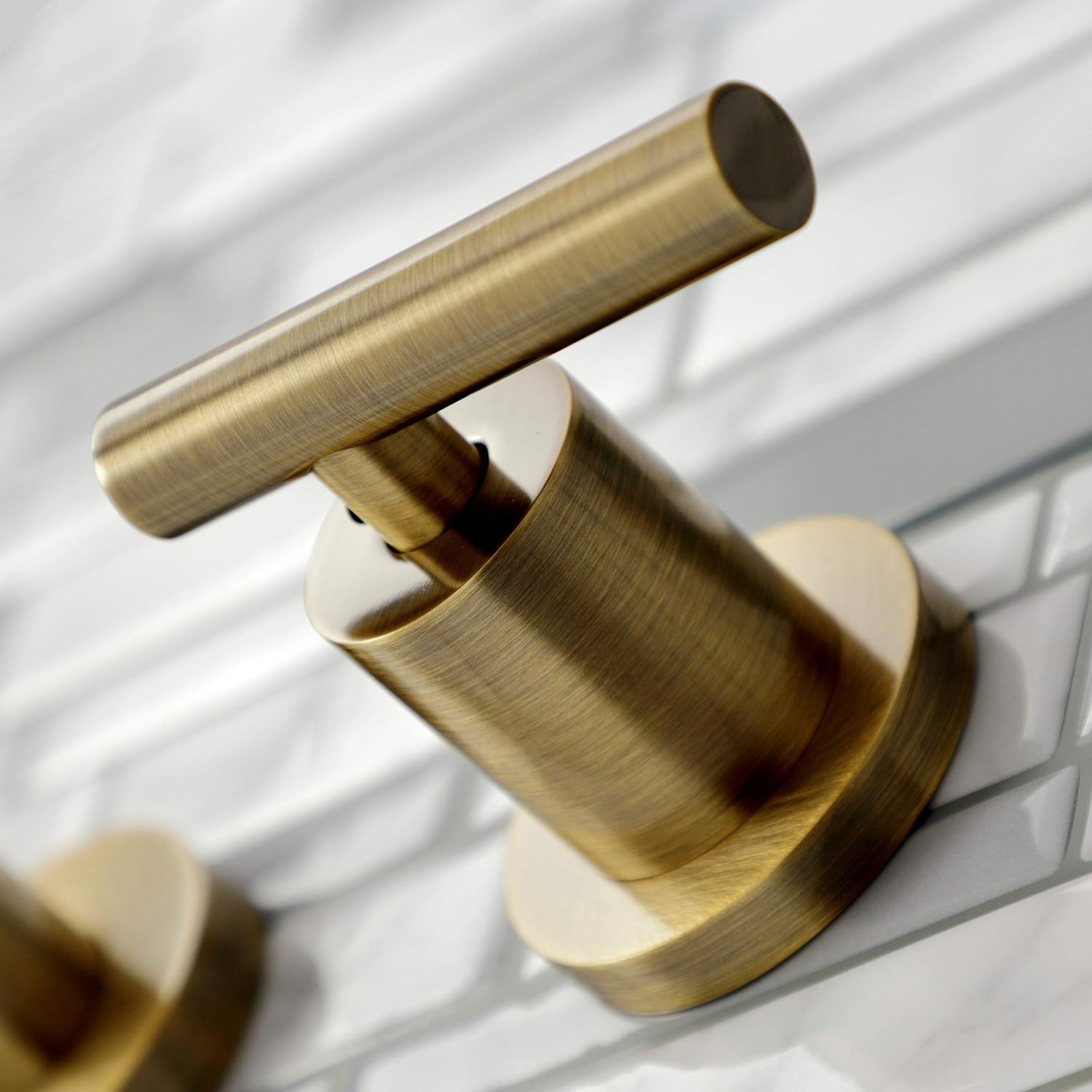 Kingston Brass KS8123CML Manhattan 2-Handle 8 in. Wall Mount Bathroom Faucet, Antique Brass